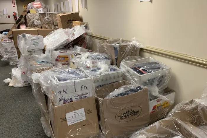 Piles of completed packets at the Paterson Schools Central Office Building in April when students who did not have a device instead completed assignment on paper and dropped them off.